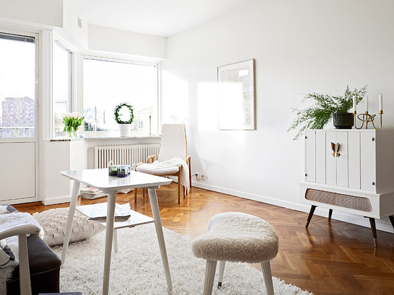 白色简约风一居室公寓客厅地板装修效果图