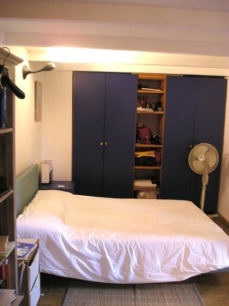 西班牙风格两室一厅卧室实木衣柜软装效果图