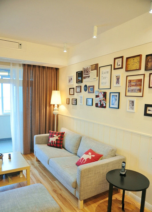 50平清新北欧风二居室客厅沙发背景墙装修效果图