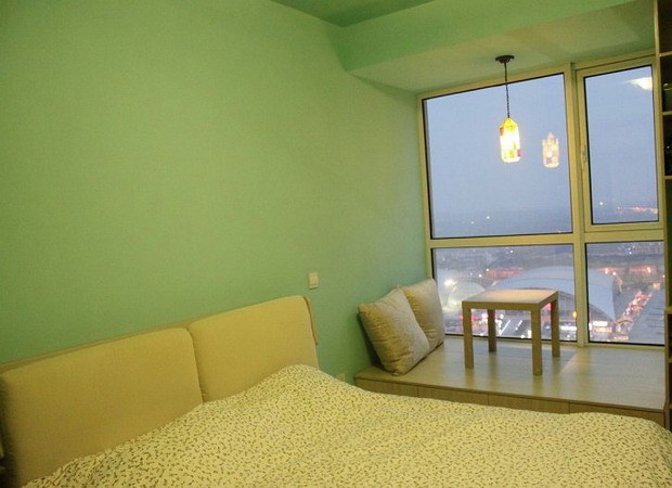 60平简约一居室绿色清新卧室装修效果图